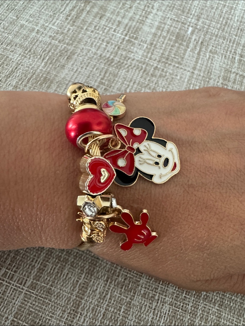 Disney Gold-Tone Minnie Mouse Charm Bracelet with Red and Black Accents